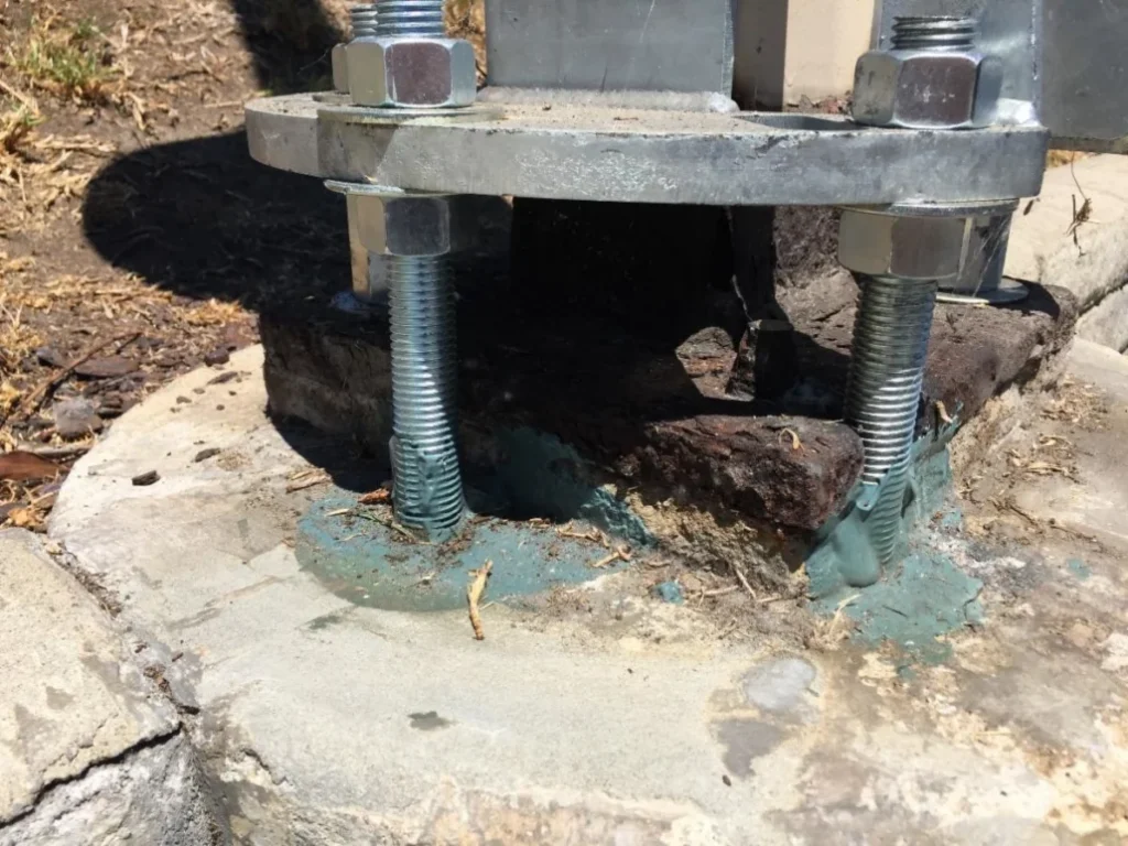 ew threaded anchor rods installed with epoxy in an existing concrete light pole footing