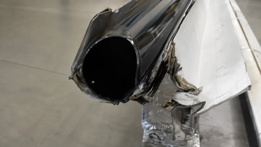 Bent and damaged round light pole caused by improper shipping or handling