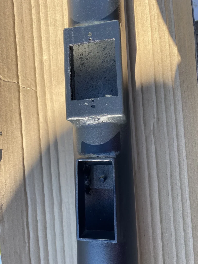 Light pole hand hole with receptacle mounting provision